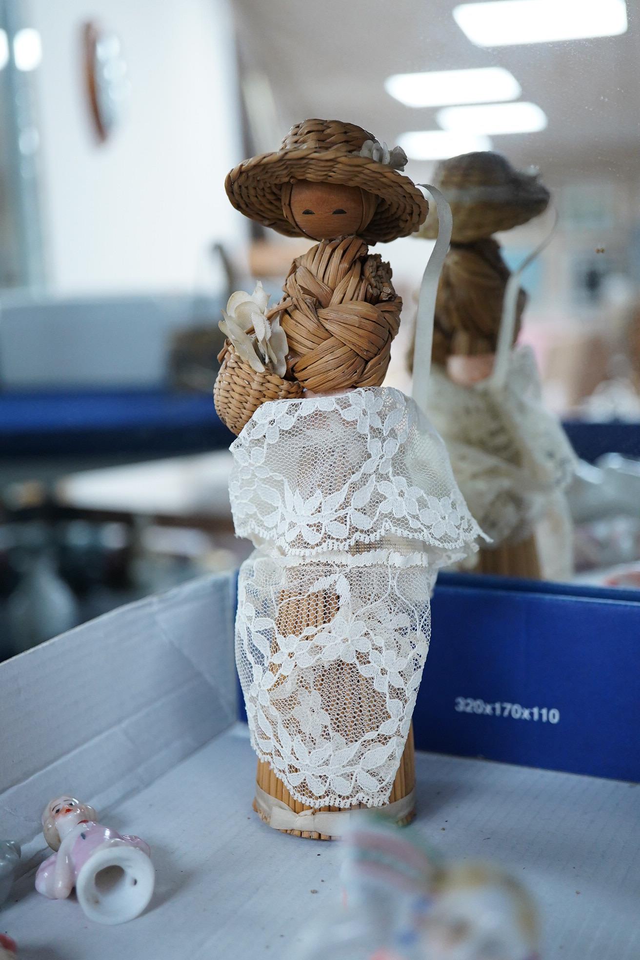 A collection of vintage porcelain half dolls and a bisque porcelain example with jointed limbs